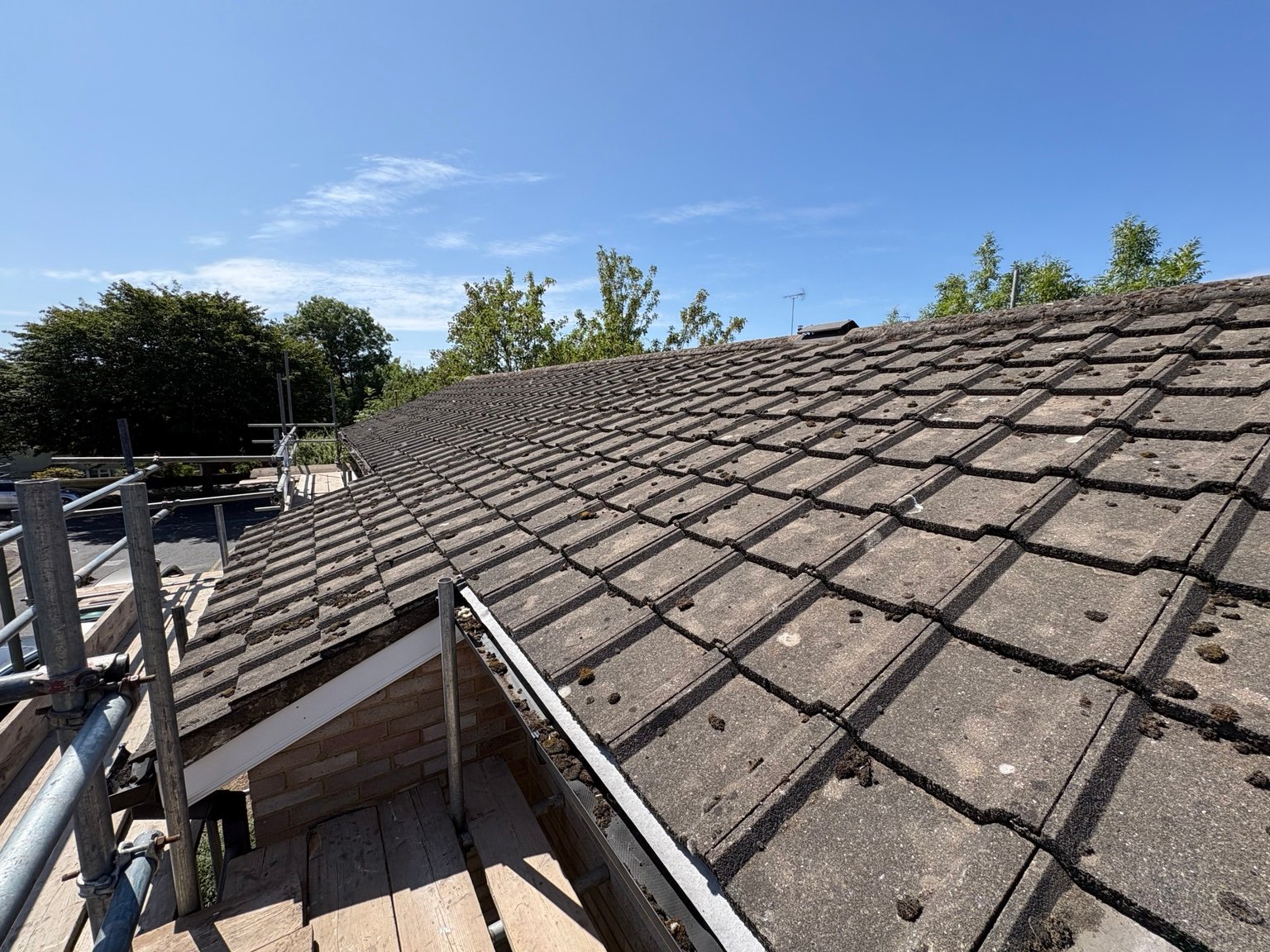 Existing roof covering before work