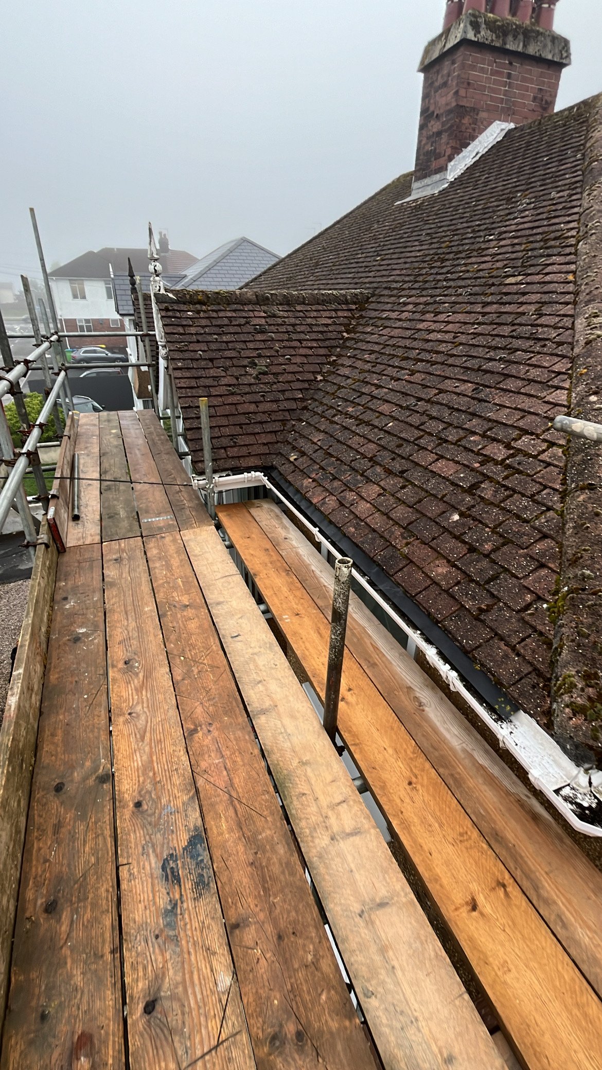 Completed tiled roof and chimney detail