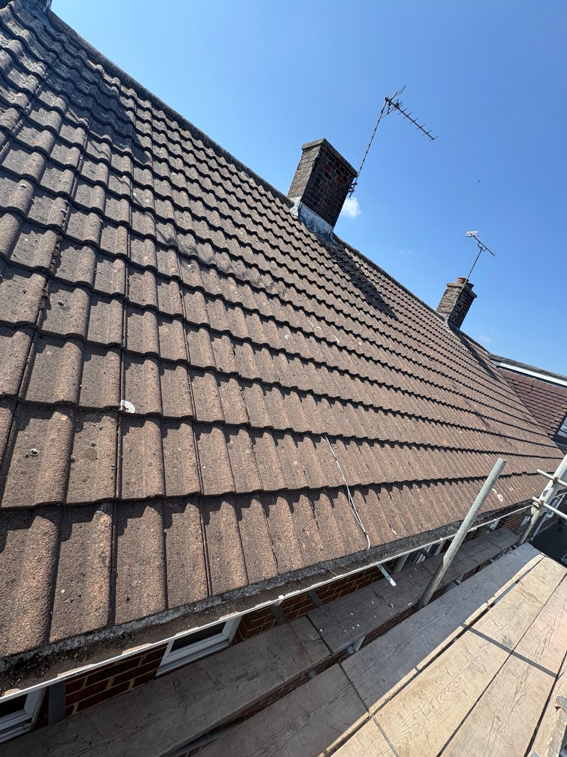 Existing tiled roof before replacement
