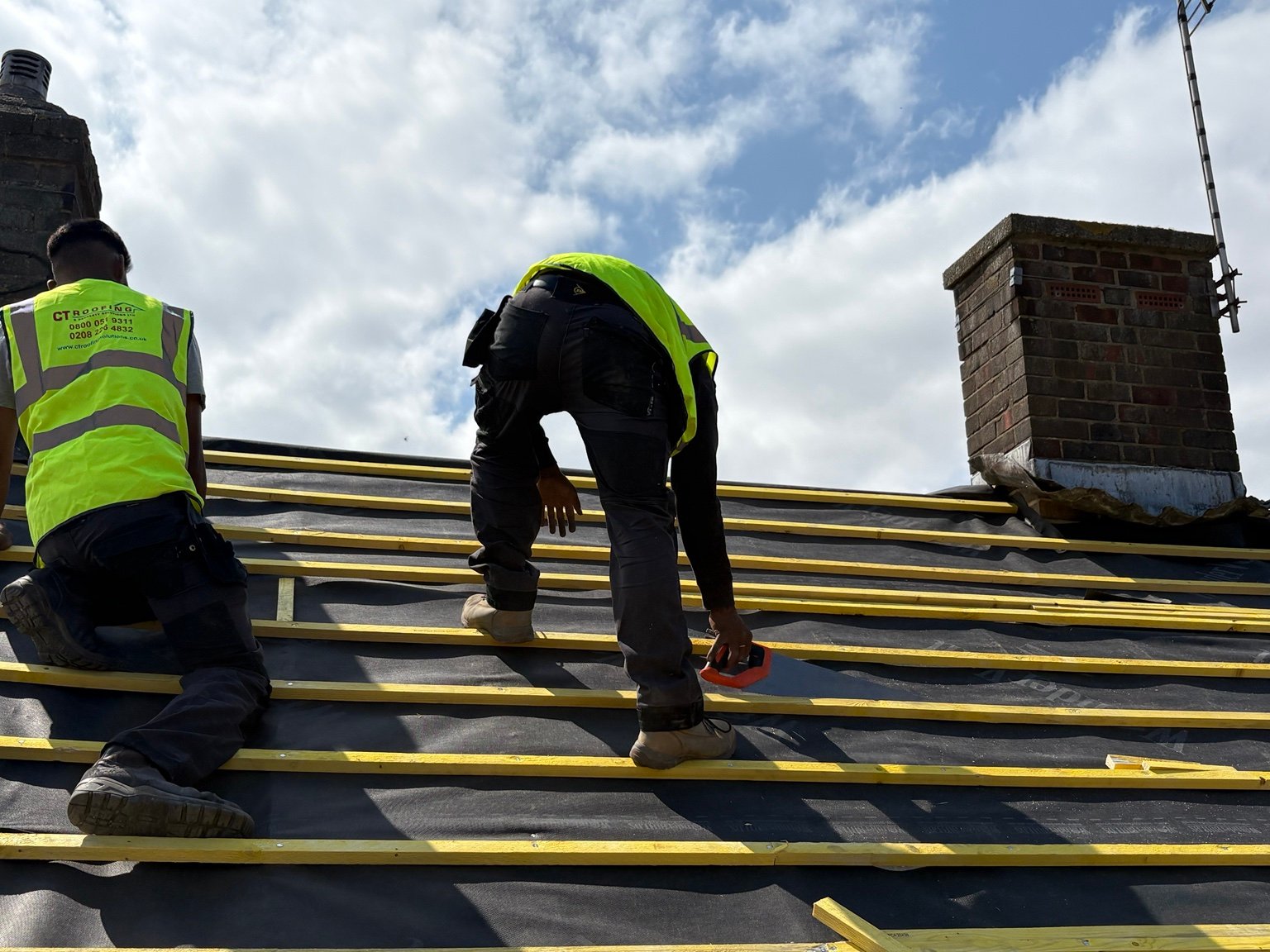Breathable membrane and battens being installed