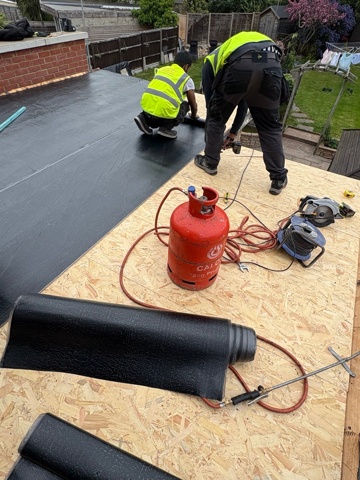 SL500 torch-on felt installation in progress